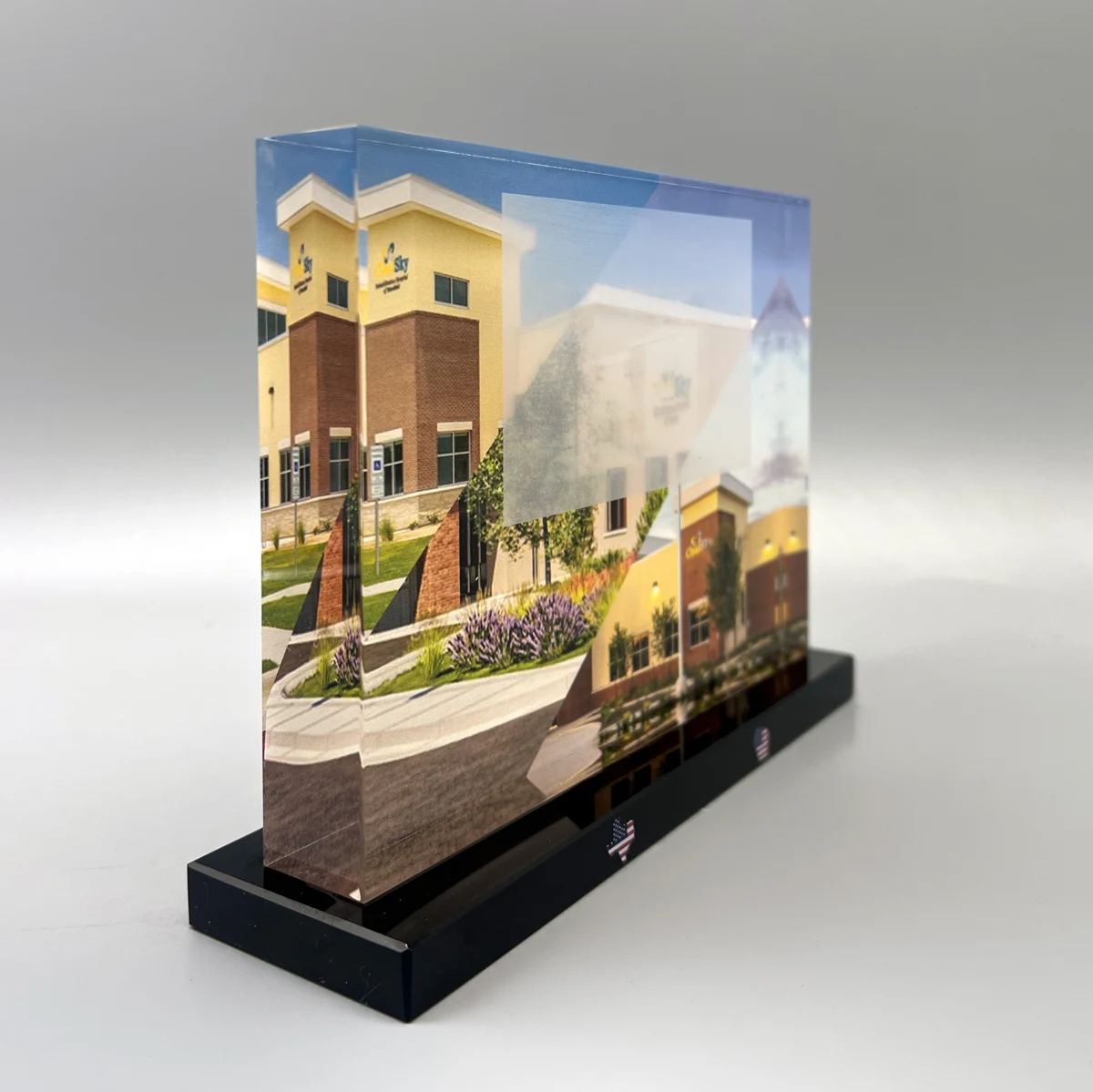 A layered arrangement of property photographs brings multiple commercial assets together.